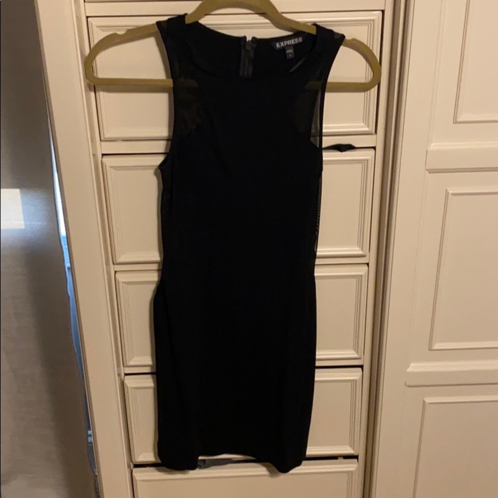 Tight black mini dress with mesh detail